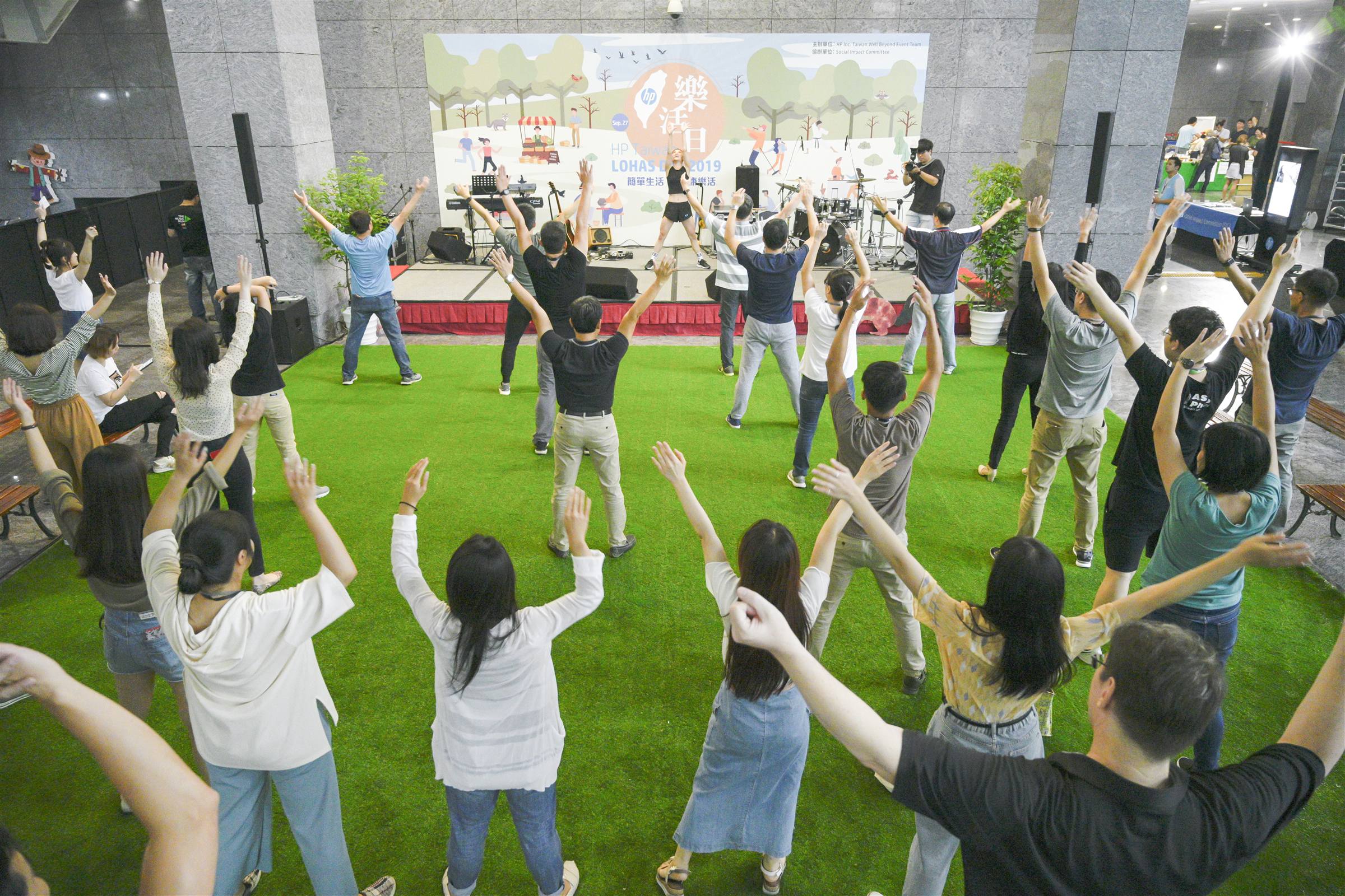 Employees in a large group well-being activity